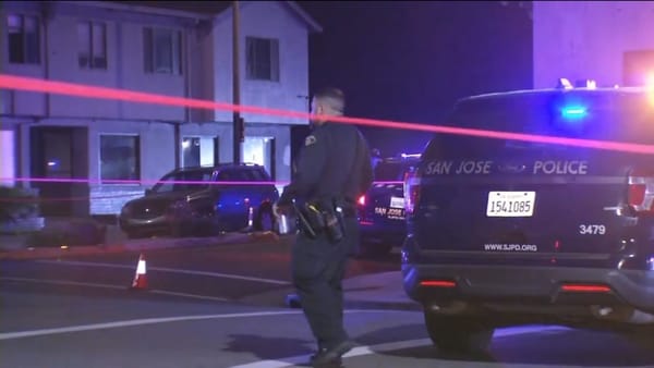 Police officer shot during pursuit of armed suspect